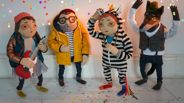 Cover der Single, darauf zu sehen sind vier Figuren im Konfettiregen